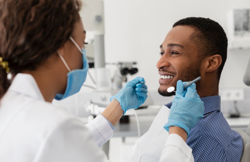 Patient smiling after cosmetic dentistry treatment